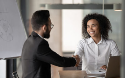Two businesspeople shaking hands